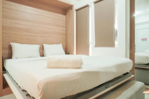 Lovely and Strategic Studio at Green Pramuka Apartment By Travelio